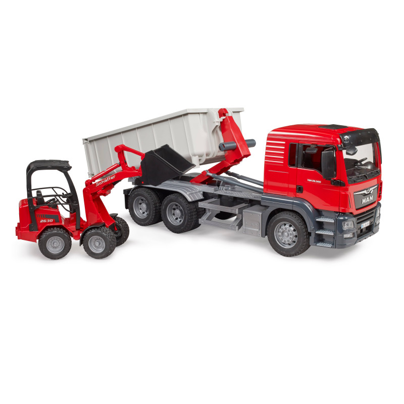 MAN TGS met rolcontainer en Schaffer compacte lader 2630 MAN TGS met rolcontainer en Schaffer compacte lader 2630