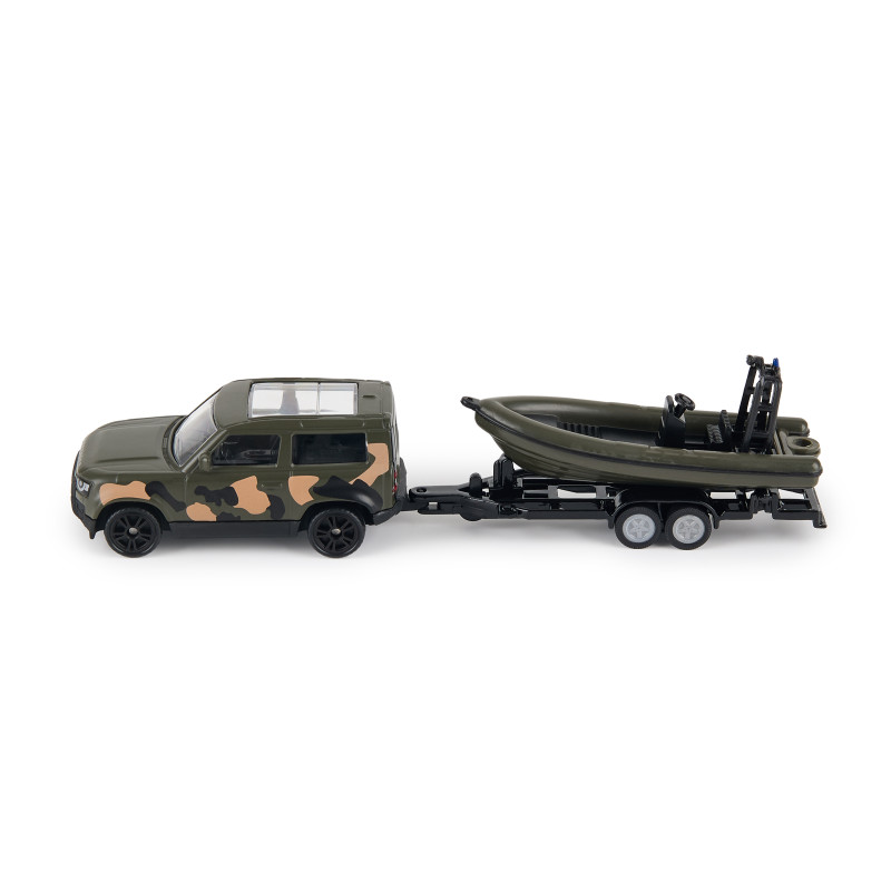 Land Rover Defender with military recue boat Land Rover Defender with military recue boat